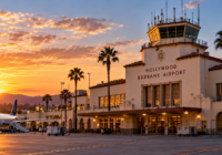 Illustrated view of Hollywood Burbank Airport's historic passenger terminal at sunset as the airport prepares to move to a new terminal in October 2026.